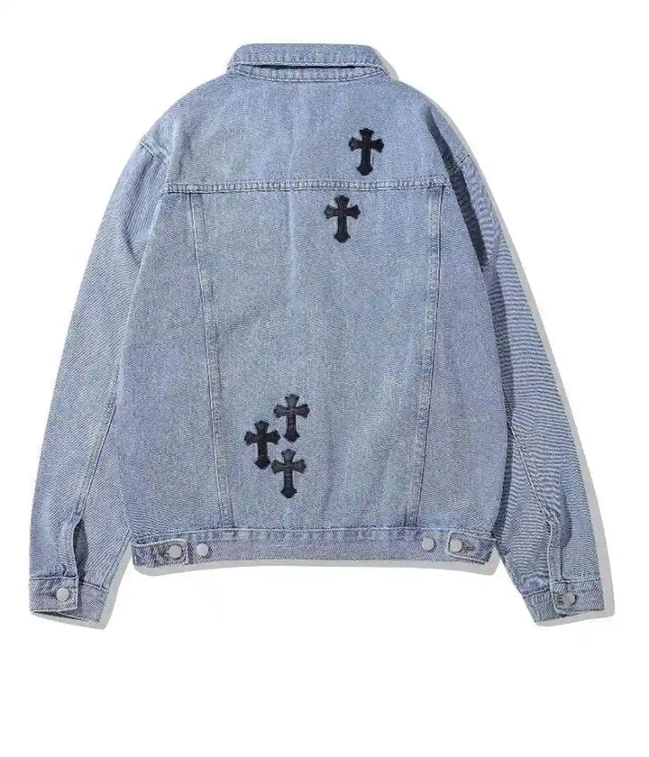 Back view of blue denim jacket featuring black cross 