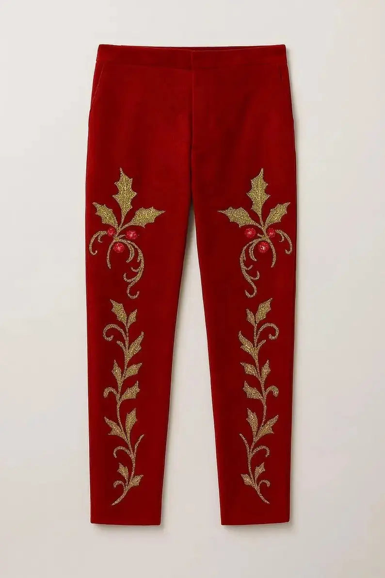 Front view of red slim-fit trousers, featuring gold glitter holly and berry embroidery