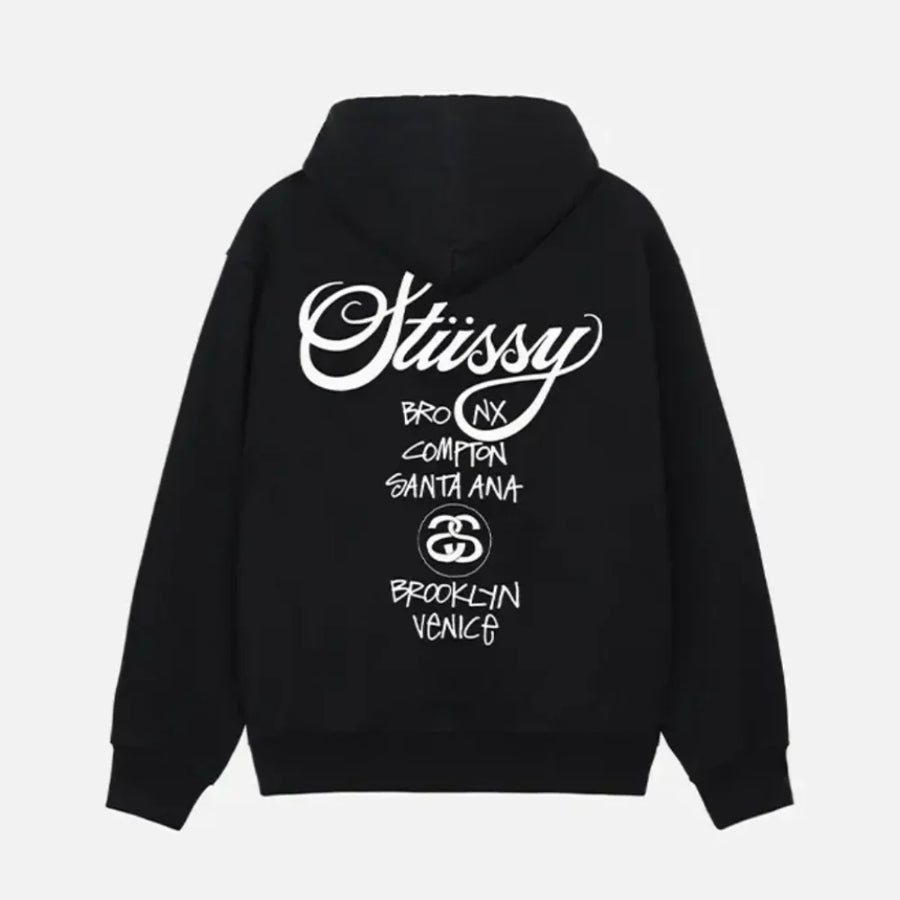 Back view of black hoodie featuring featuring Stüssy World Tour Text