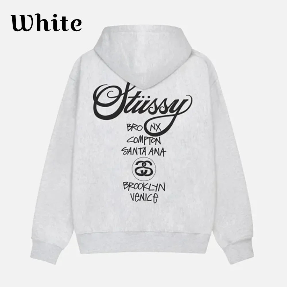 Back view of a white pullover hoodie featuring Stüssy World Tour Logo