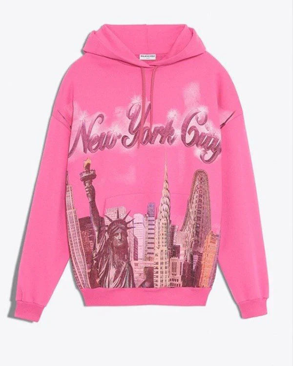 Front view of a pink pullover hoodie featuring 'New York City'