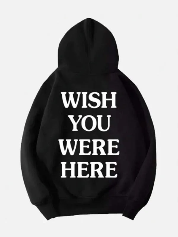 Back view of a black hoodie featuring text 'WISH YOU WERE HERE' 