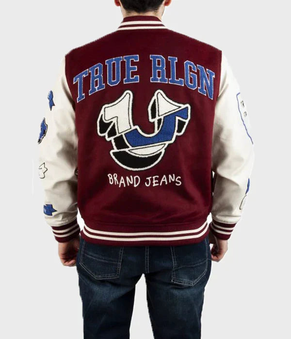 Person wearing a maroon and beige True Religion Letterman Jacket with 'True Rlgn' branding on the back.