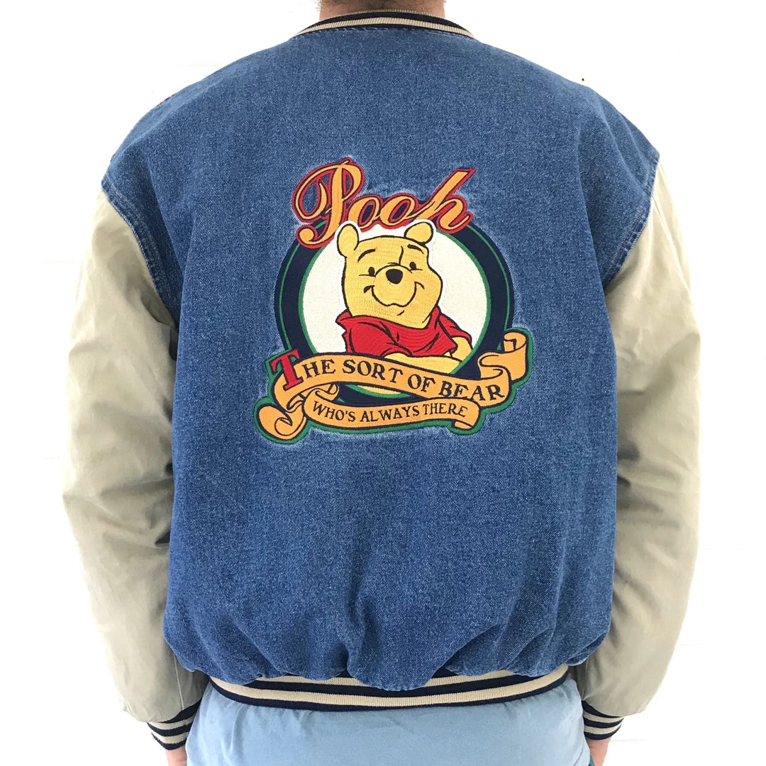 Blue and beige Winnie The Pooh Denim Jacket with a Winnie the Pooh design on the back