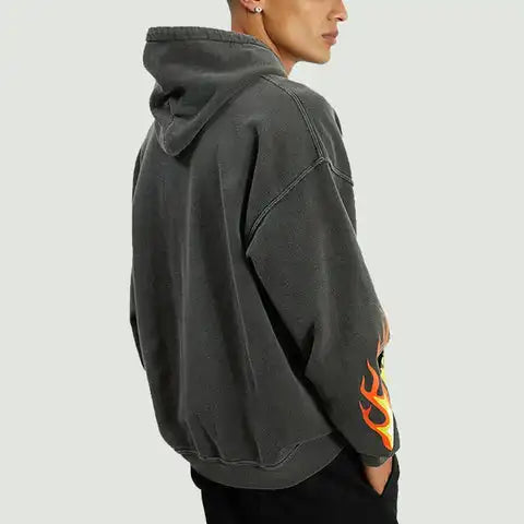Back view of the oversized, distressed gray hoodie