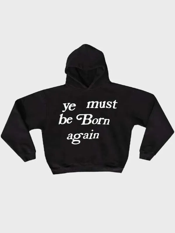 Black hoodie with white text 'ye must be Born again' on a light gray background