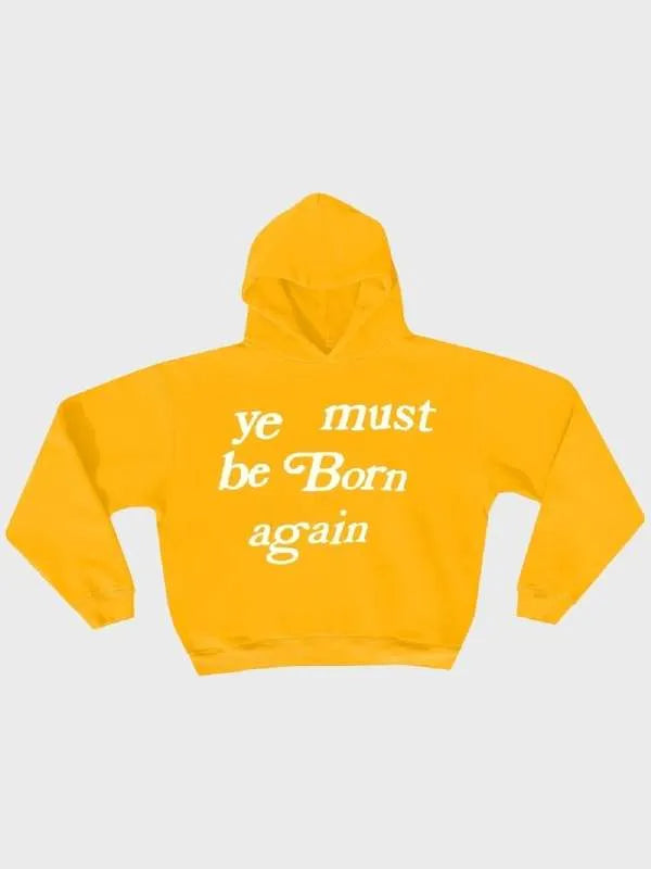 Yellow hoodie with white text "Ye Must Be Born Again Hoodie" on a light gray background