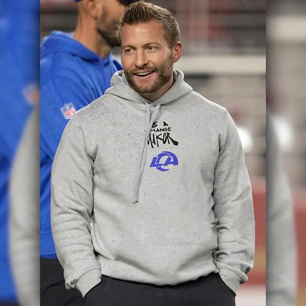 Front view of a gray hoodie with text 'BE A CHANGE MAKER' and the LA logo.